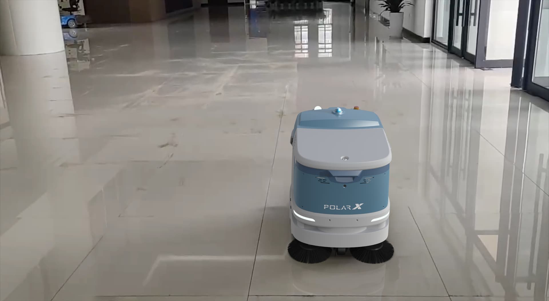 Commercial cleaning robot operating on polished floor in large facility