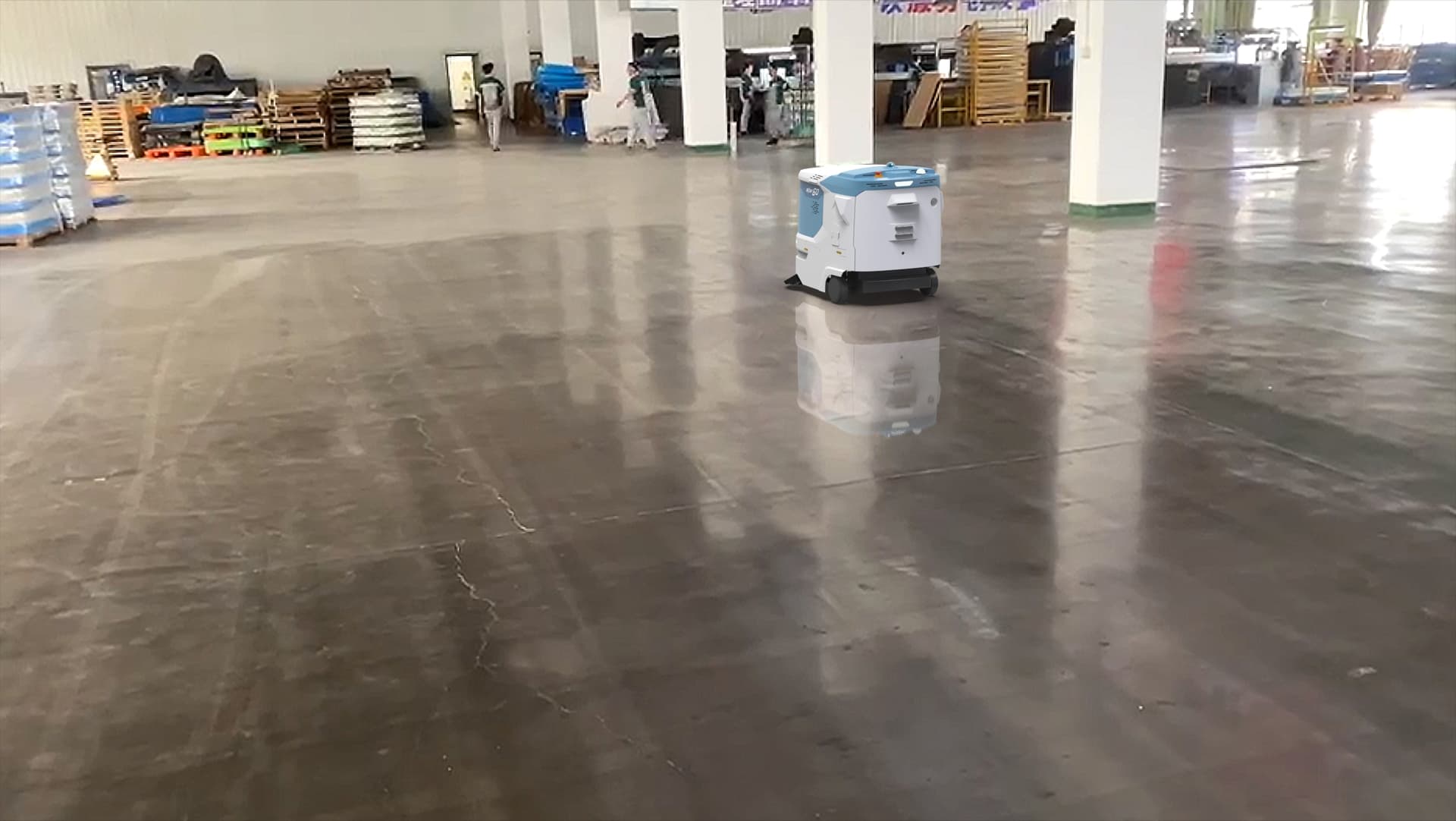 Autonomous floor care robot operating across a commercial facility