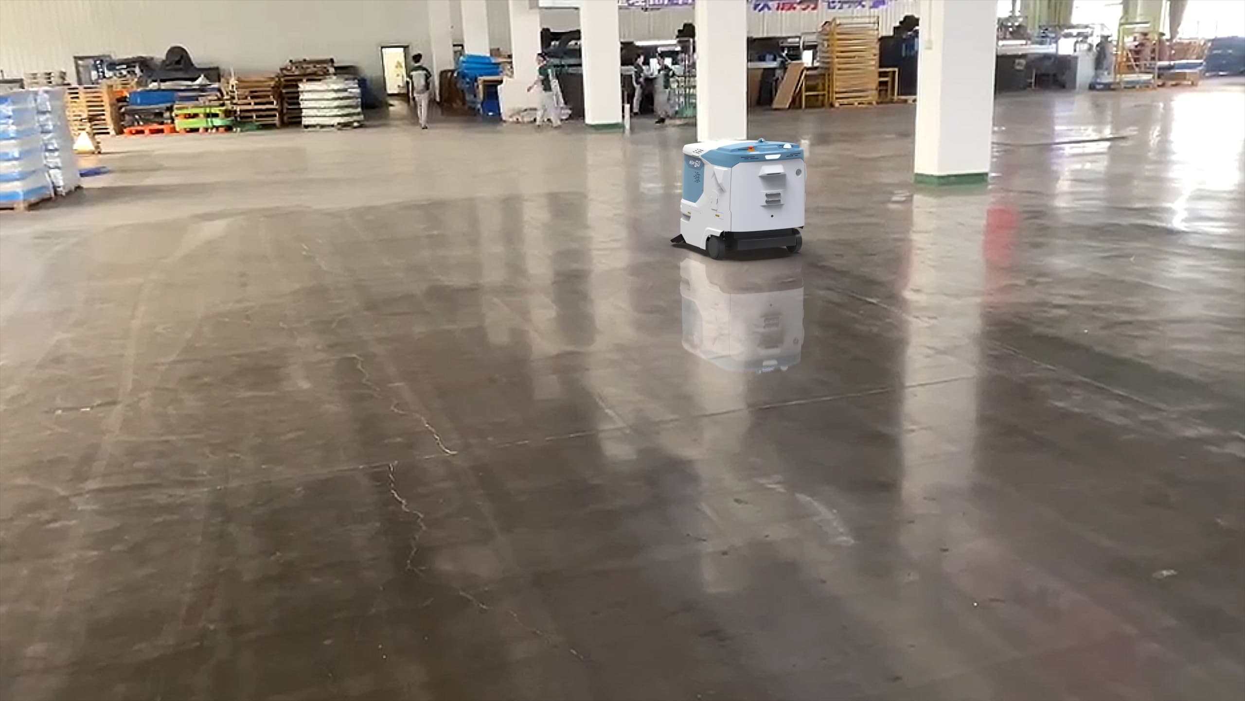 Autonomous floor care robot operating across a commercial facility