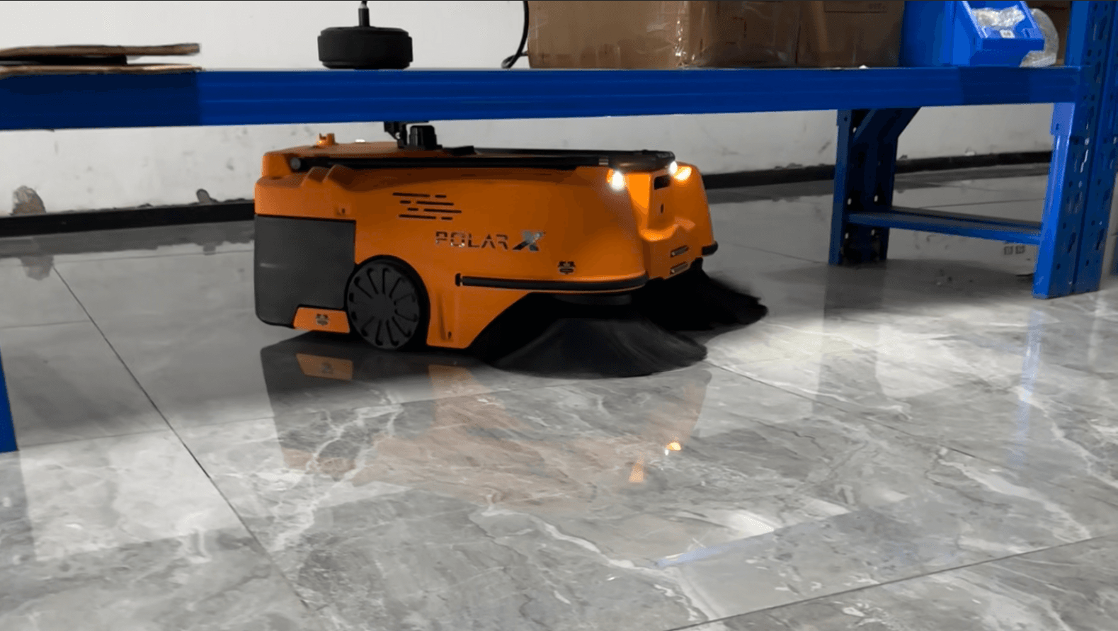 PolarX Star50 operating beneath warehouse racking